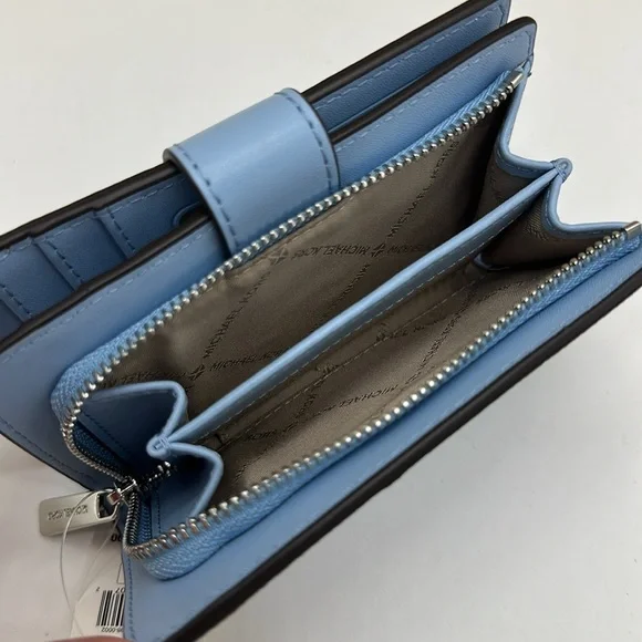 Michael Kors Jet Set Travel Medium Printed Signature Logo Bi-Fold Wallet
LT SKY - Picture 10 of 15